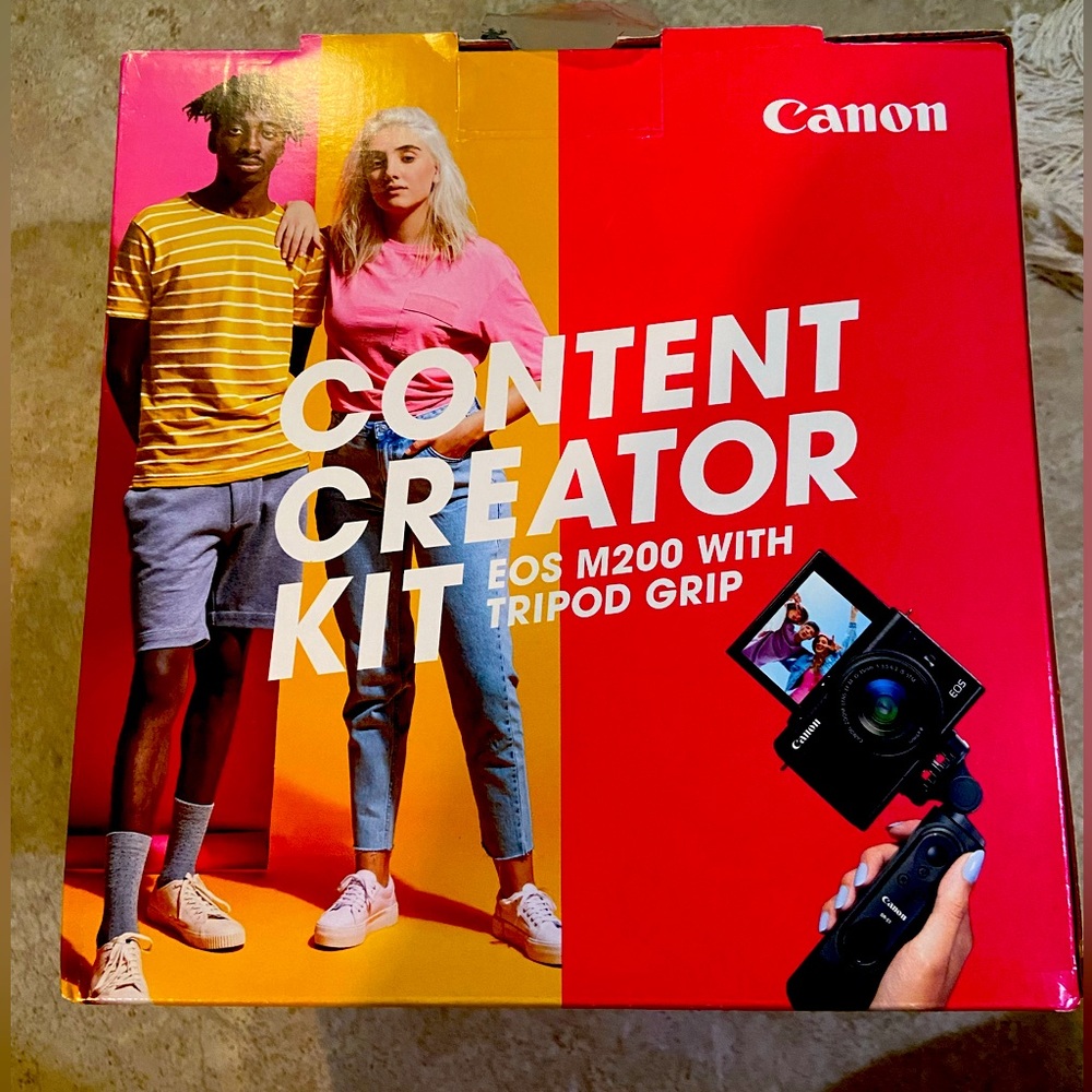 Canon eos m200 camera with tripod grip